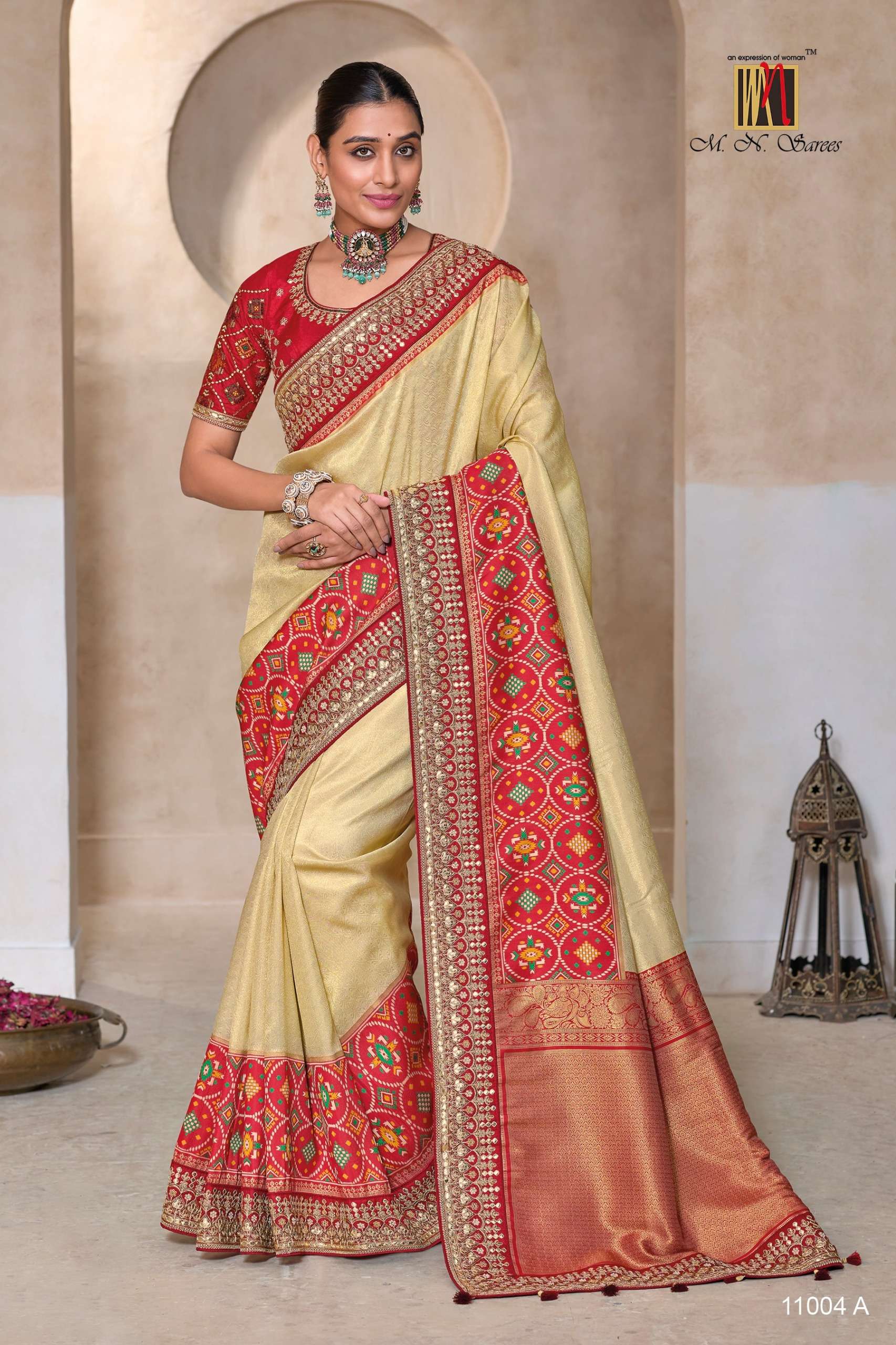 M.N PRESENTS 11004 (A to D) PARTY WEAR AND WEDDING WEAR SAREES CATALOG WHOLESALER