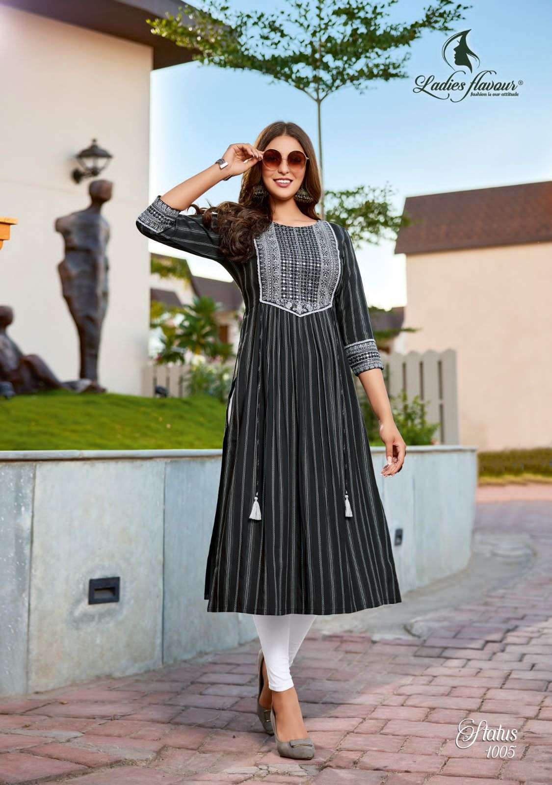 Ladies flavour presents Status Rayon designer kurtis catalog wholesaler and exporters 