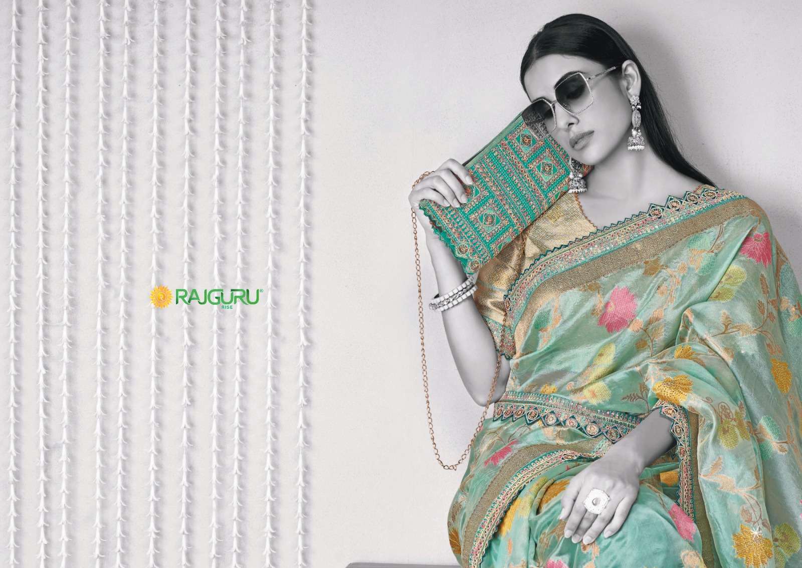 RAJGURU PRESENTS MANIRATNAM DESIGNER FANCY SAREES CATALOG WHOLESALER AND EXPORTER IN SURAT 
