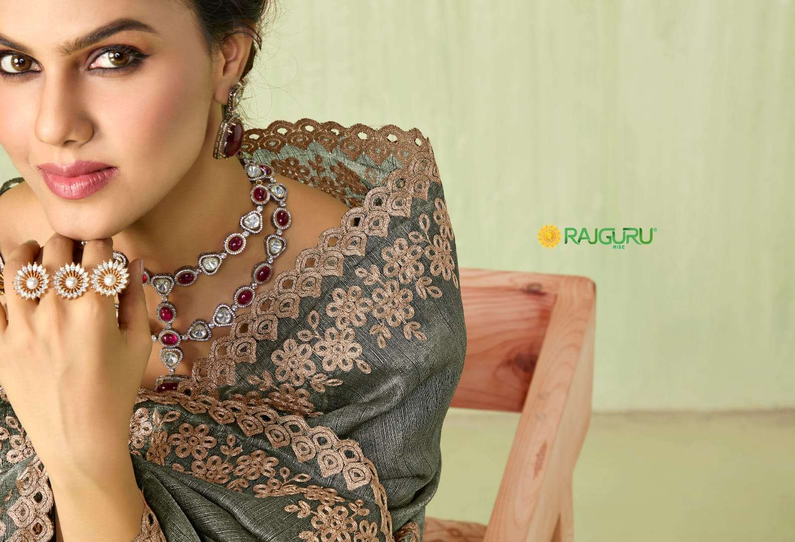 RAJGURU PRESENTS NAVYA DESIGNER FANCY SAREES CATALOG WHOLESALER AND EXPORTER IN SURAT