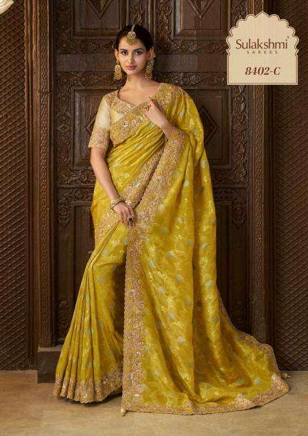 SULAKSHMI PRESENTS THE WEDDING SAGA COLOURS TISSUE SILK PARTY WEAR SAREES CATALOG WHOLESALER AND EXPORTER 