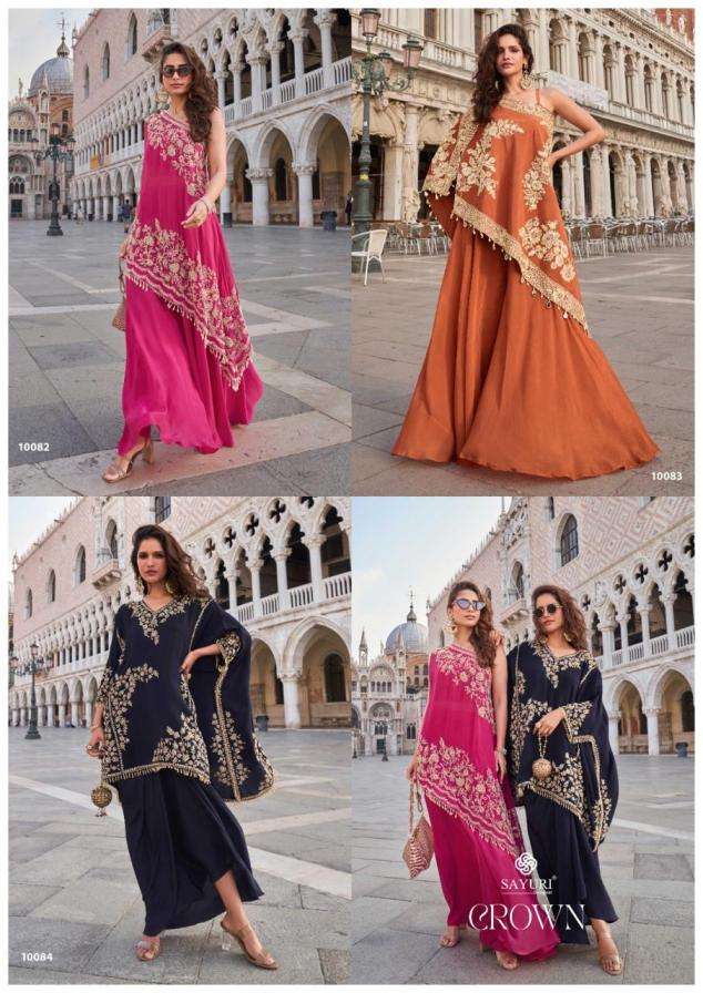 SAYURI DESIGNER PRESENTS CROWN FULLY STITCH PREIMUM CREP PARTY WEAR SUITS CATALOG WHOLESALER AND EXPORTER 