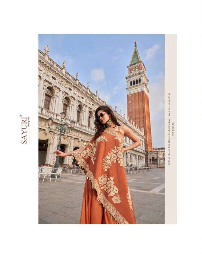 SAYURI DESIGNER PRESENTS CROWN FULLY STITCH PREIMUM CREP PARTY WEAR SUITS CATALOG WHOLESALER AND EXPORTER 