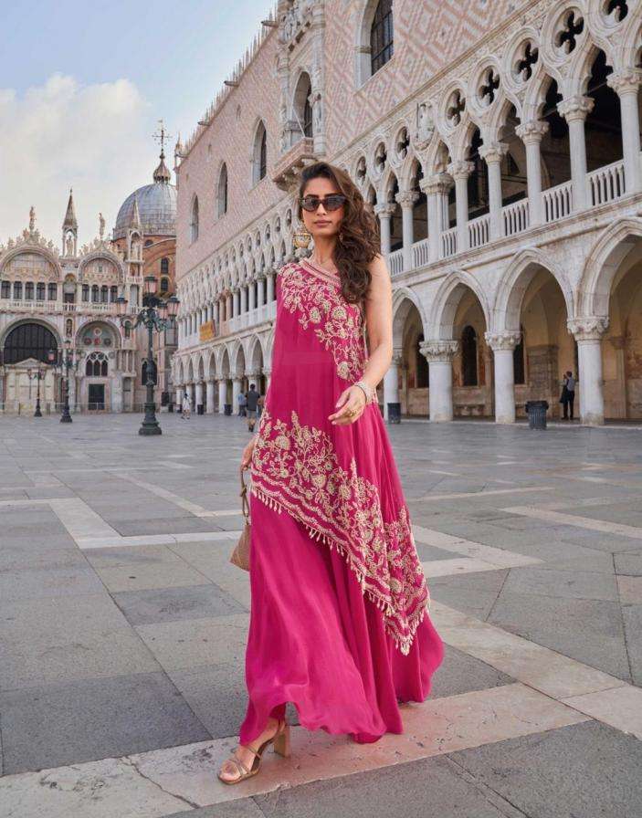 SAYURI DESIGNER PRESENTS CROWN FULLY STITCH PREIMUM CREP PARTY WEAR SUITS CATALOG WHOLESALER AND EXPORTER 