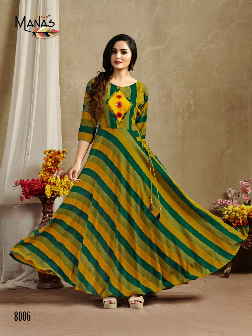 Manas Presents Classic Simple Designer Rayon Printed Gown Style Kurtis Catalogue Wholesaler